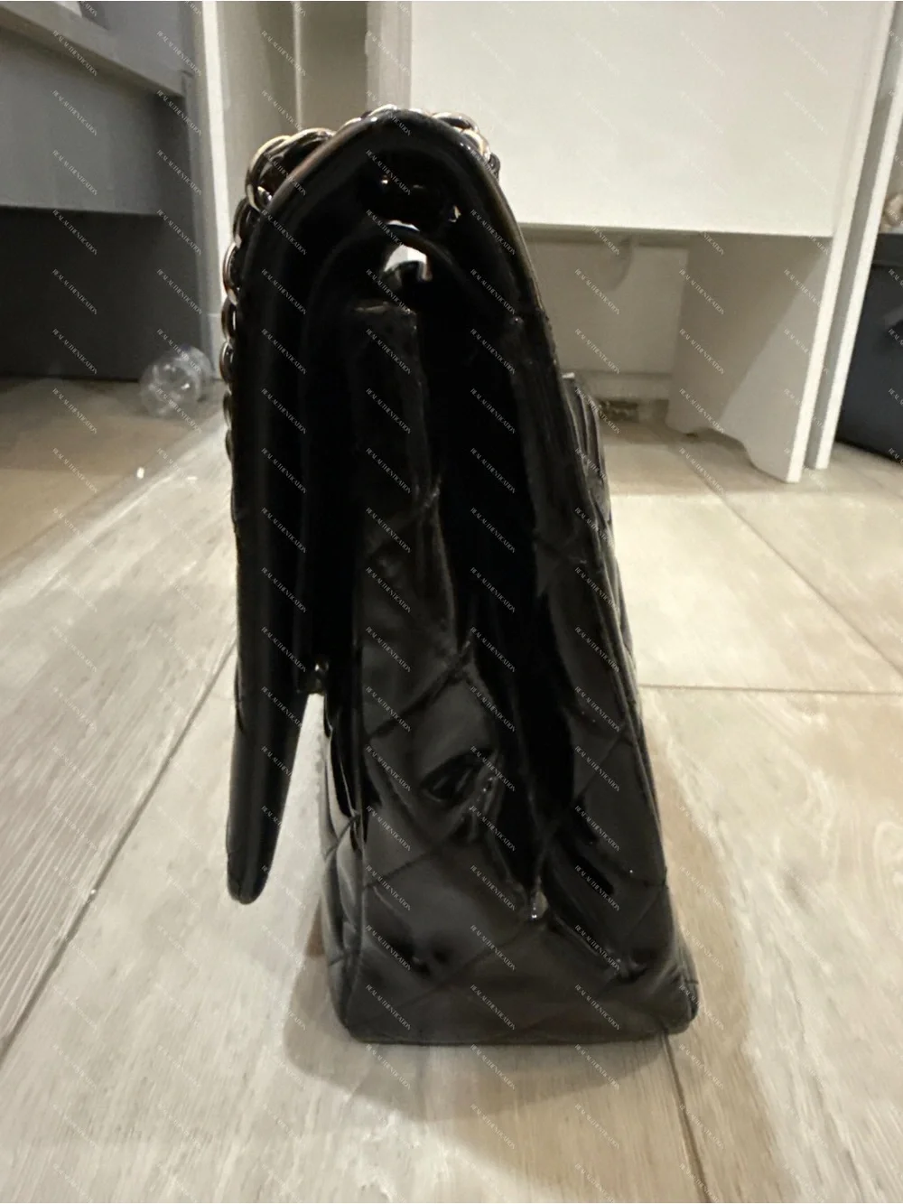 Chanel Black Quilted Patent Leather Jumbo Classic Flap Bag
